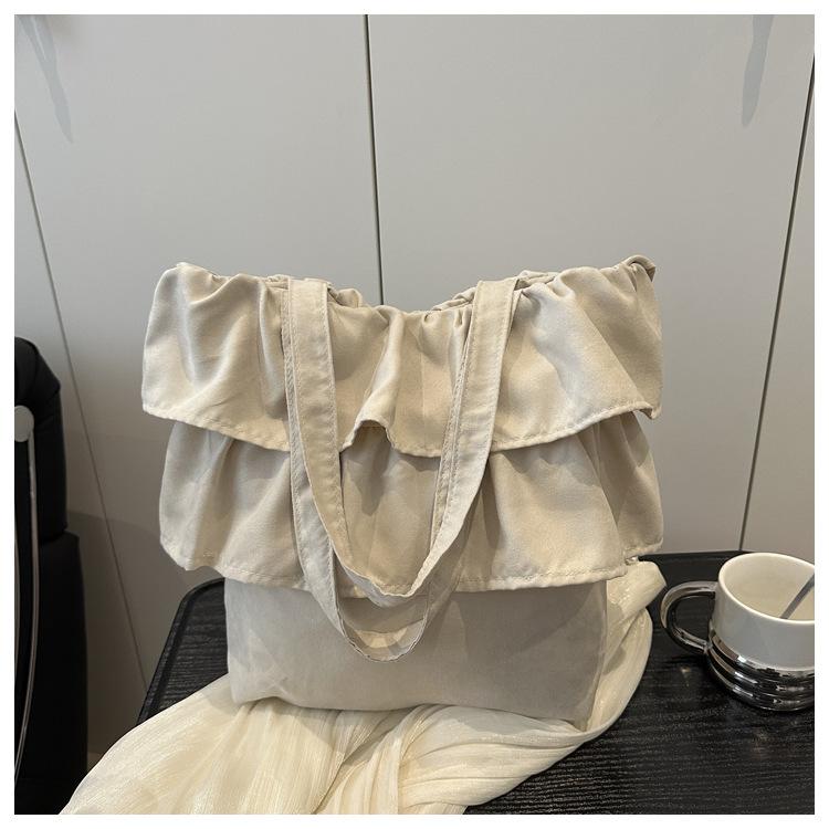 

2025 Korean version of the new skirt wrinkled large-capacity tote bag lazy style casual simple canvas bag bag белый