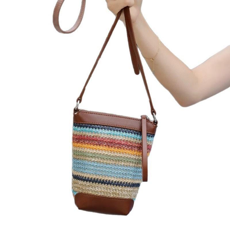 

Lafite Grass With Cowhide Woven Bag Bucket Niche Fashionable Exquisite Color All-matching Single-shoulder Cross-body Mobile Phone Length 9 width 8 height 18cm