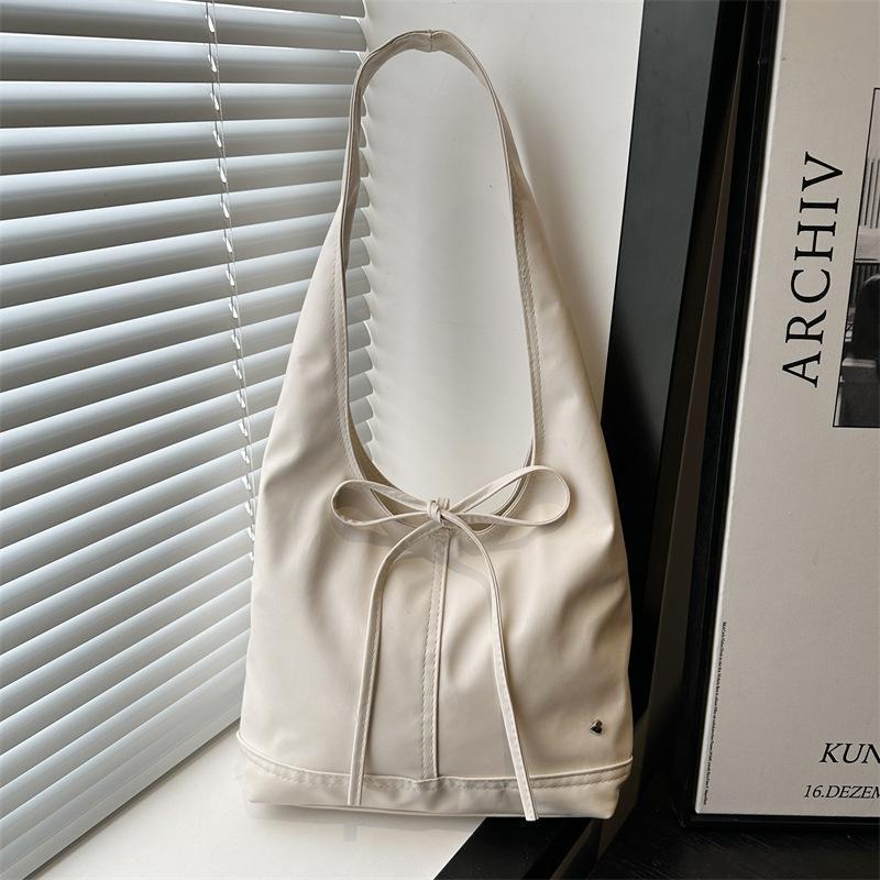 

Simple tote bag New niche women s bag Versatile bow Large capacity shoulder bag Underarm bag білий