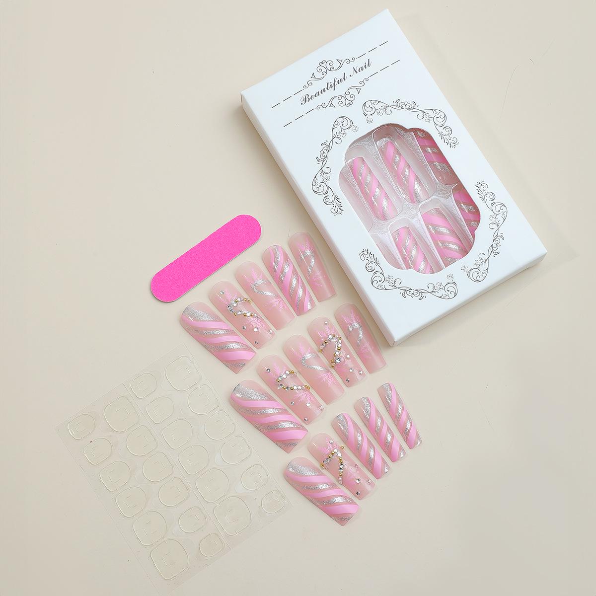 

Розовые блестящие ногти-снежинки в рождественском стиле, очень длинные, носибельные