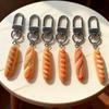 Korean-Style Fun Keyring: Creative Baguette & Pretzel Pendant for Students