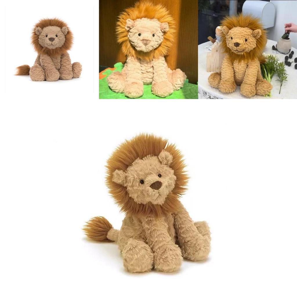 León de peluche con pelaje ondulado, ideal como regalo para niñas y para coleccionistas.