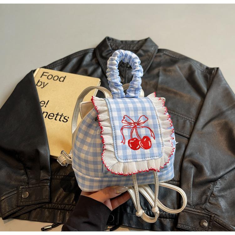 

Foreign style girl commuter backpack, portable drawstring lid, contrasting color plaid, college style schoolbag, texture embroidery backpack.