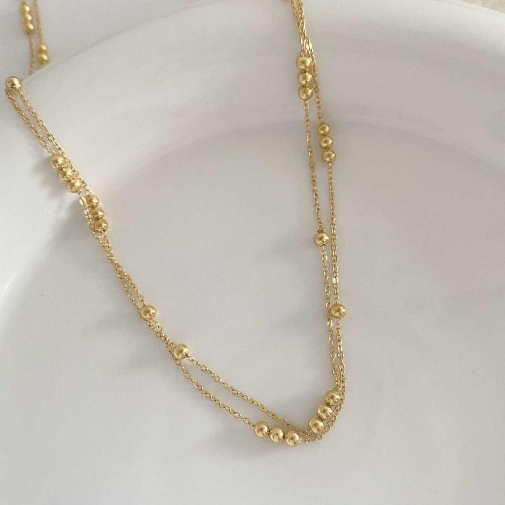 Chic Gold Double-Layer Round Bead Necklace: French Style, High-End Luxury Clavicle Chain for Women