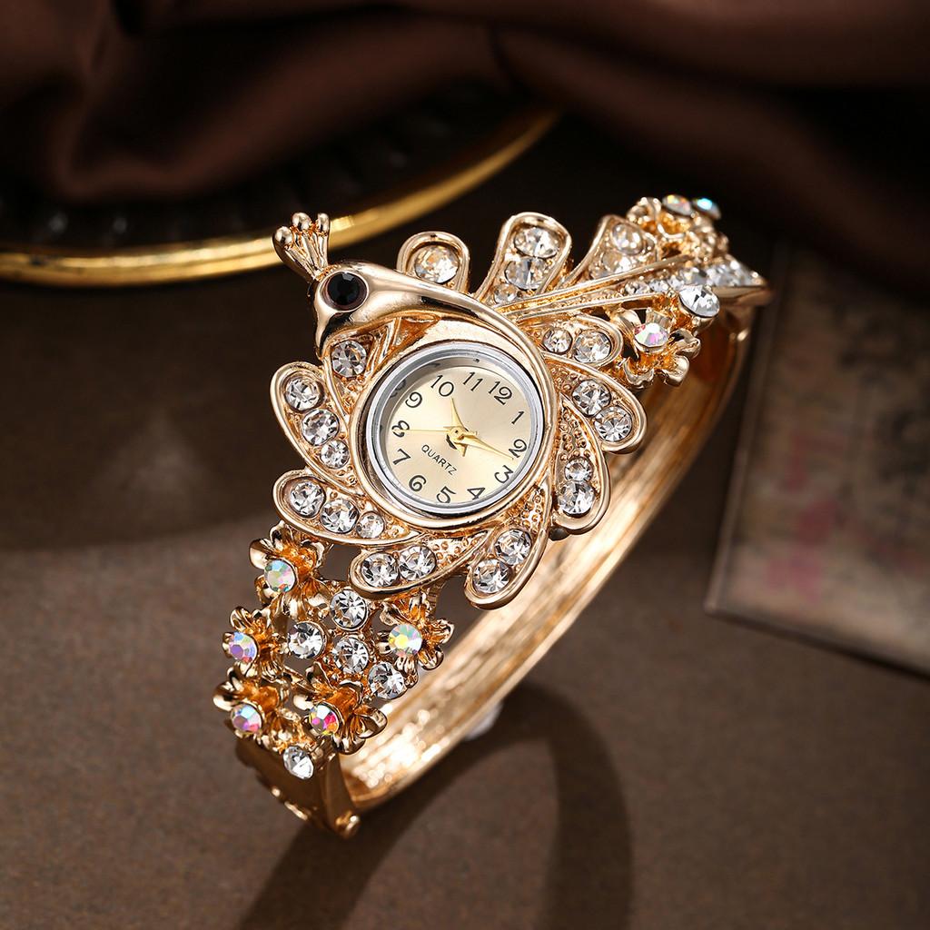 Ladies Peacock Stone Quartz Watch With Hollow Flower Alloy Bracelet For Fashion Accessory
