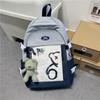 Dopamine Japanese schoolbag female niche simple teenager junior high school college student large capacity computer backpack