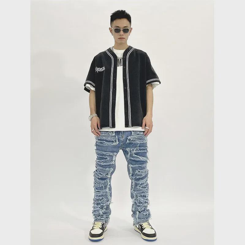 American Style Distressed Slim-Fit Jeans with Whisker Washing and Patch Details.