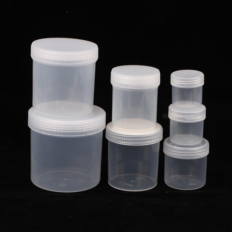 Průhledná uzavřená plechovka s víkem Plastová prázdná balící láhev Kruhové úložiště kbelík Sklenice na sušenky Potravinářské uzavřené plechovky Nádržka