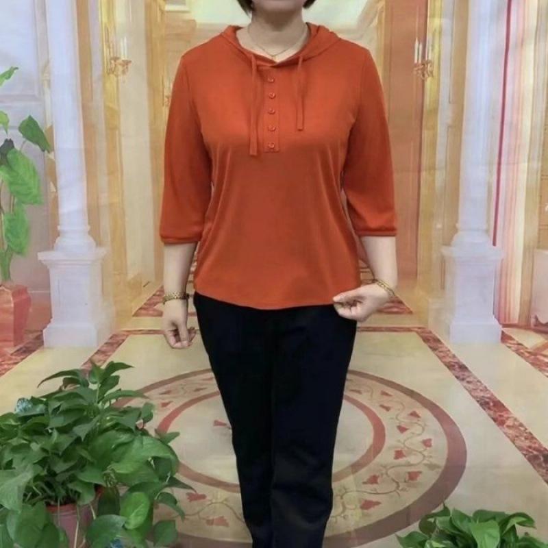 Chic Age-Defying Hooded Women's Spring Top - Loose Fit, Elastic, Versatile, Seven-Sleeve Design.