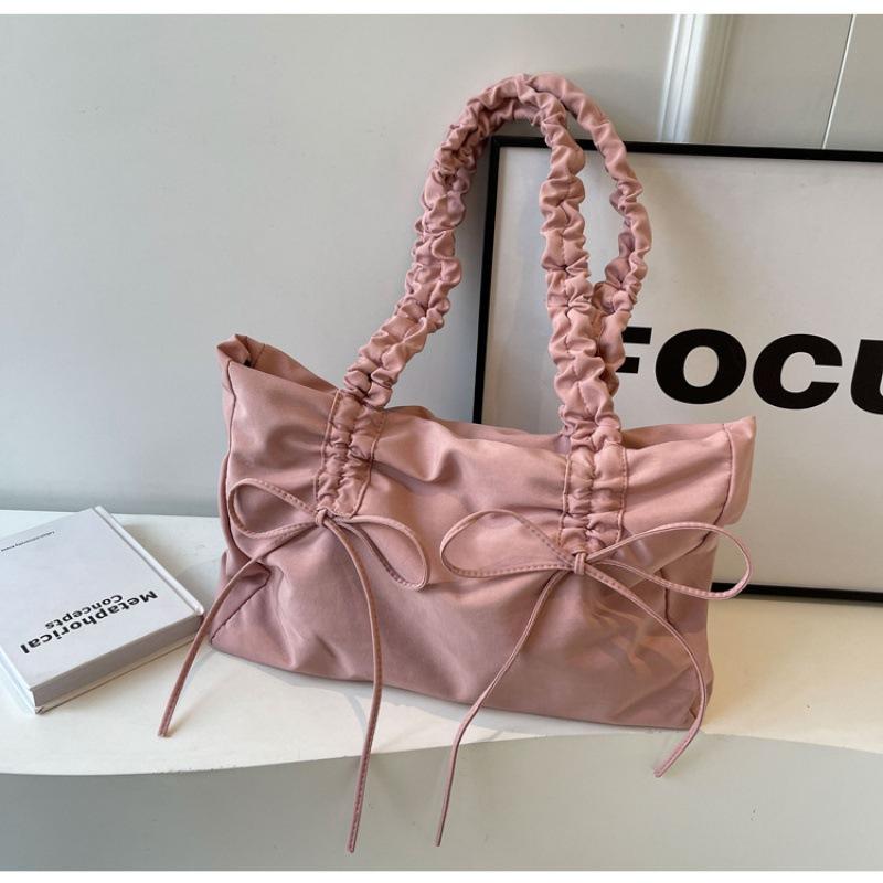 

Fashion pleated niche design large-capacity tote bag 2025 new Korean version bow women s bag shoulder armpit bag розовый