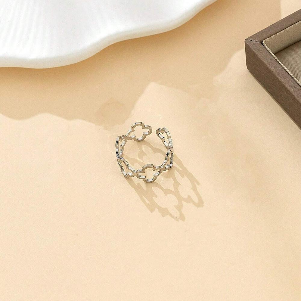 DOTIF Stainless Steel Lucky Hollow Four-Leaf Clover Ring Female Fashion Simple Opening Adjustable Finger Jewelry Party Gifts