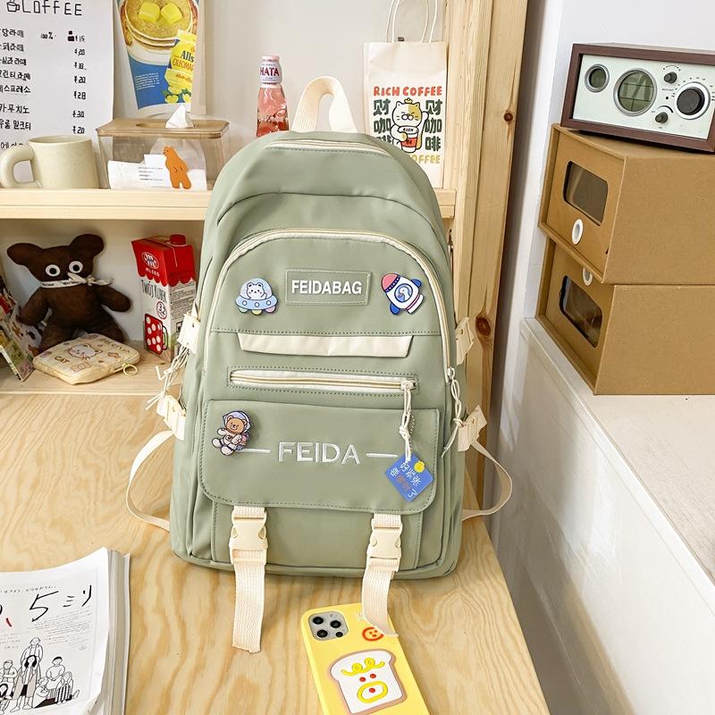 Schoolbag new schoolbag female junior high school Korean version large capacity double backpack primary school students third to sixth grade cute