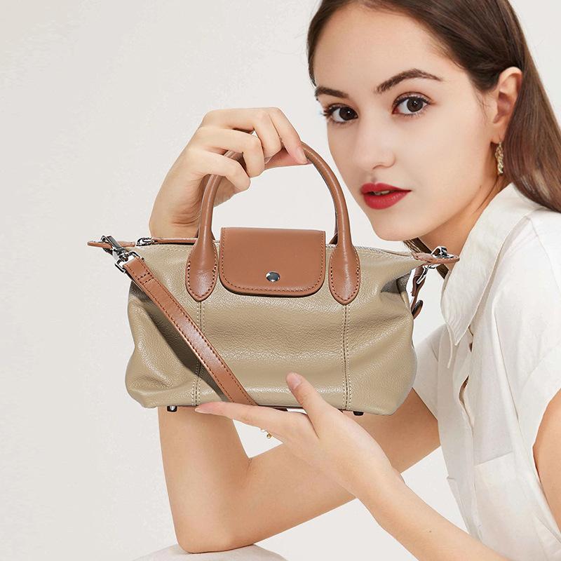 The first layer of cowhide fashion dumpling bag, versatile leather high-end color contrast large-capacity handbag women