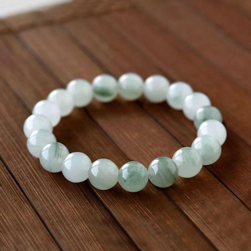 Women's Natural Tianshan Green Jade Bracelet with Round Beads and Floating Flower Design