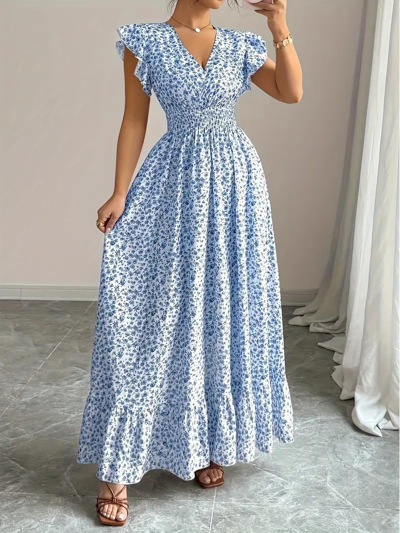 

2026 S/S European & American V-Neck Floral Print Midi Dress with Cinched Waist, High Waist, and Short Sleeves L синій