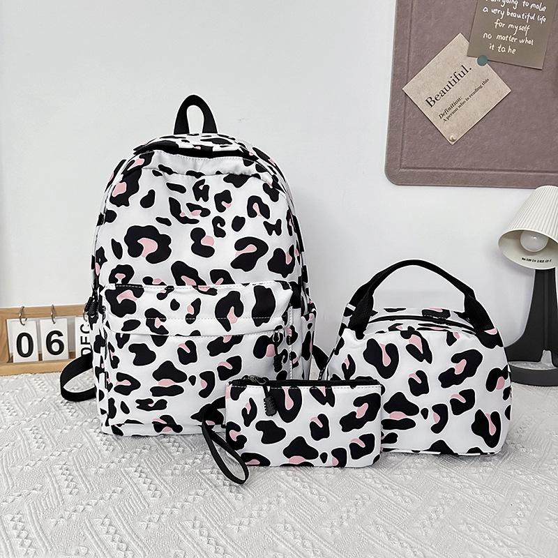 Schoolbag backpack, college student capacity, casual printing three-piece lunch bag, light weight for primary and secondary school students