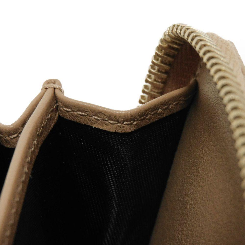 Used Guccissima Coin Purse 9539 544249 BMJ1G 2754 7943 with Embossed Double G Logo and Zip Around Closure, Micro GG