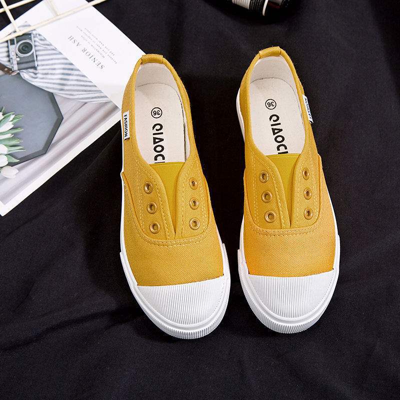 Segeltuchschuhe Frühling flach Ein-Pedal faule Schuhe Board Schuhe Trend
