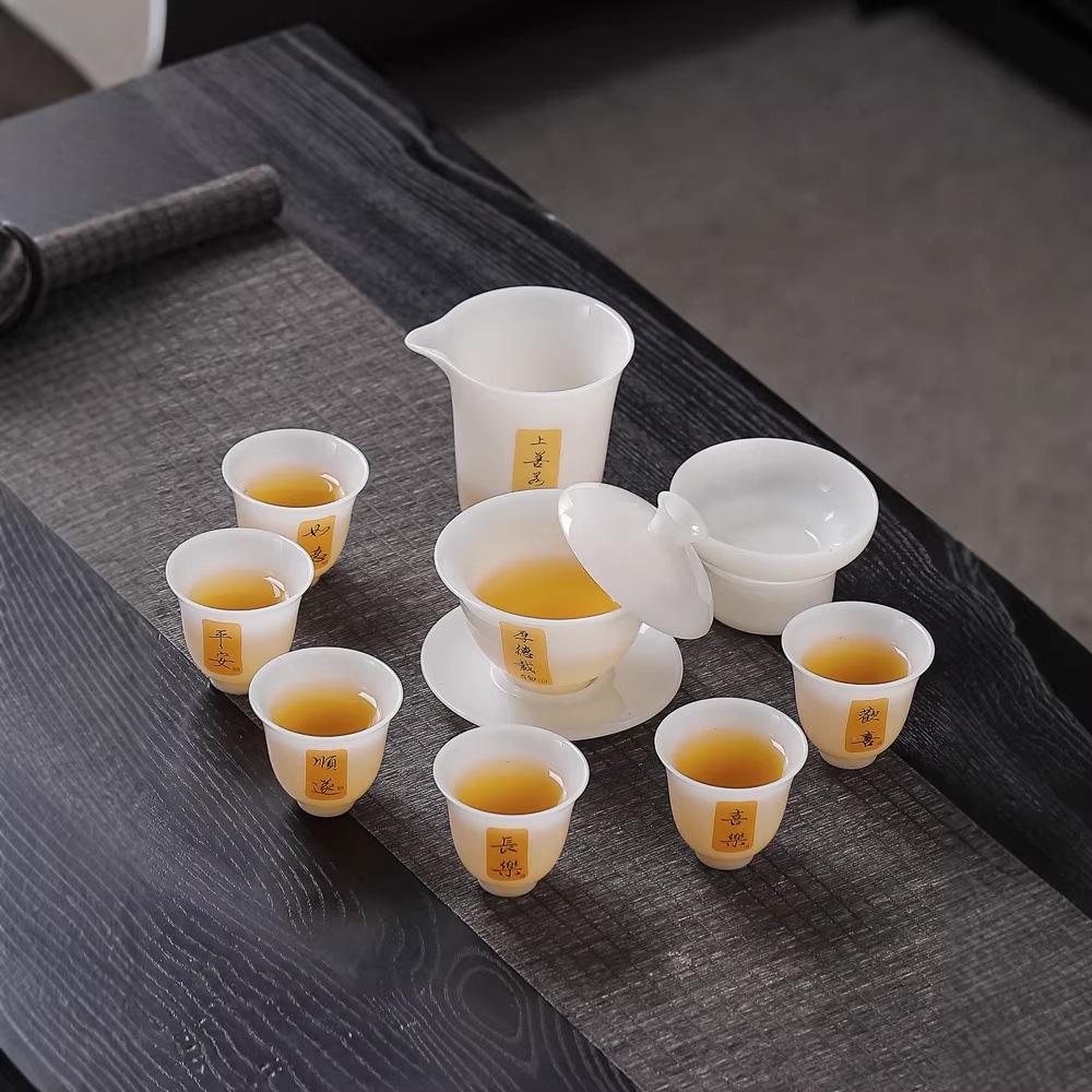 Set da tè freddo in porcellana giada pu, set da tè Kung Fu, l'intero set di scatole regalo può essere confezionato con set regalo aziendali.