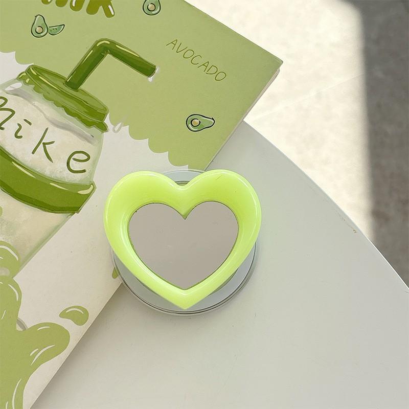 

Magnetic Portable Makeup Mirror Minimalist Heart-shaped Phone Airbag Holder Retractable Lazy Bracket Desktop Video Watching