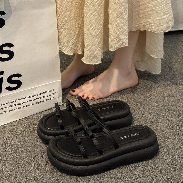 

Evening breeze gentle slippers women s 2025 summer new French beige sandals seaside beach thick heel bow women s shoes 35