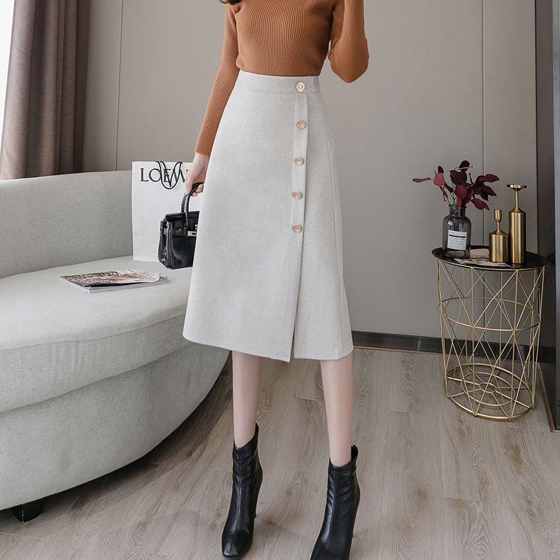 

Black A-line Woolen Skirt: Hip-Hugging Design for Pear-shaped Figures, Thick Material for Autumn/Winter 2025, Mid-length. Small абрикосовый