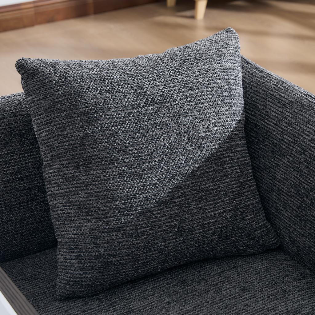 Modern single armchair with comfortable fabric backrest and two storage compartments, complemented by a practical side table.