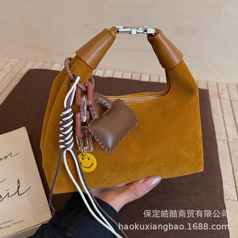 Hand Carry Fashion Dumpling Bag Women 2025 Autumn and Winter Korean Ins Simple Versatile Shoulder Bag Niche Trend Messenger Bag