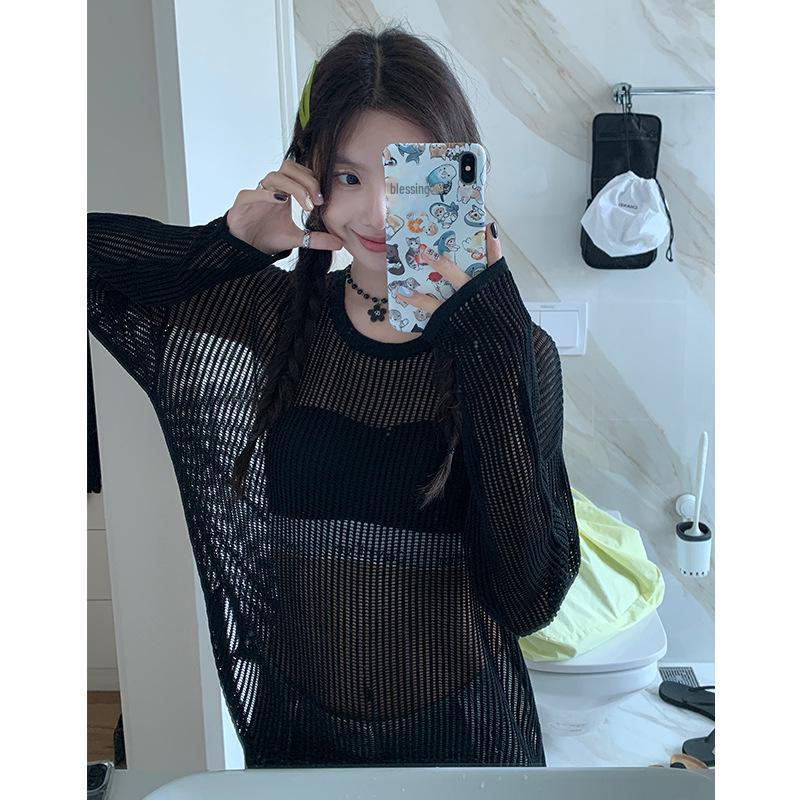 

Женский свободный кардиган с круглым вырезом из ажурной вязки - модель ранней весны 2025 г. Small