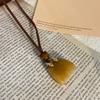 Colored artificial stone bag, wood beads, leather necklace, personalized creative design, sweater chain, Korean ins style necklace.