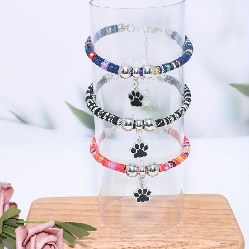 Haustierhalskette aus Nylon mit buntem Pfotenabdruck-Anhänger, verstellbares Halsband für Katzen und kleine Hunde mit ethnischem Design, stilvolles Haustier-Accessoire