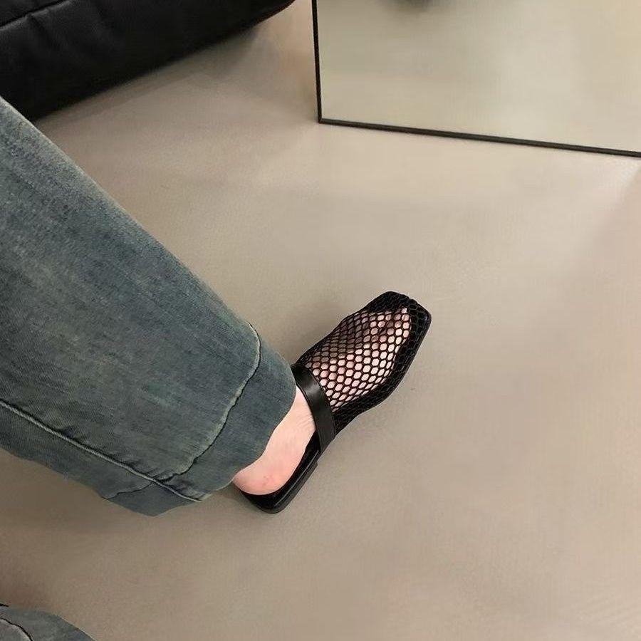 2025 spring and summer new niche woven hollow mesh sandals women European and American fashion flat bottom breathable bag head sandals women