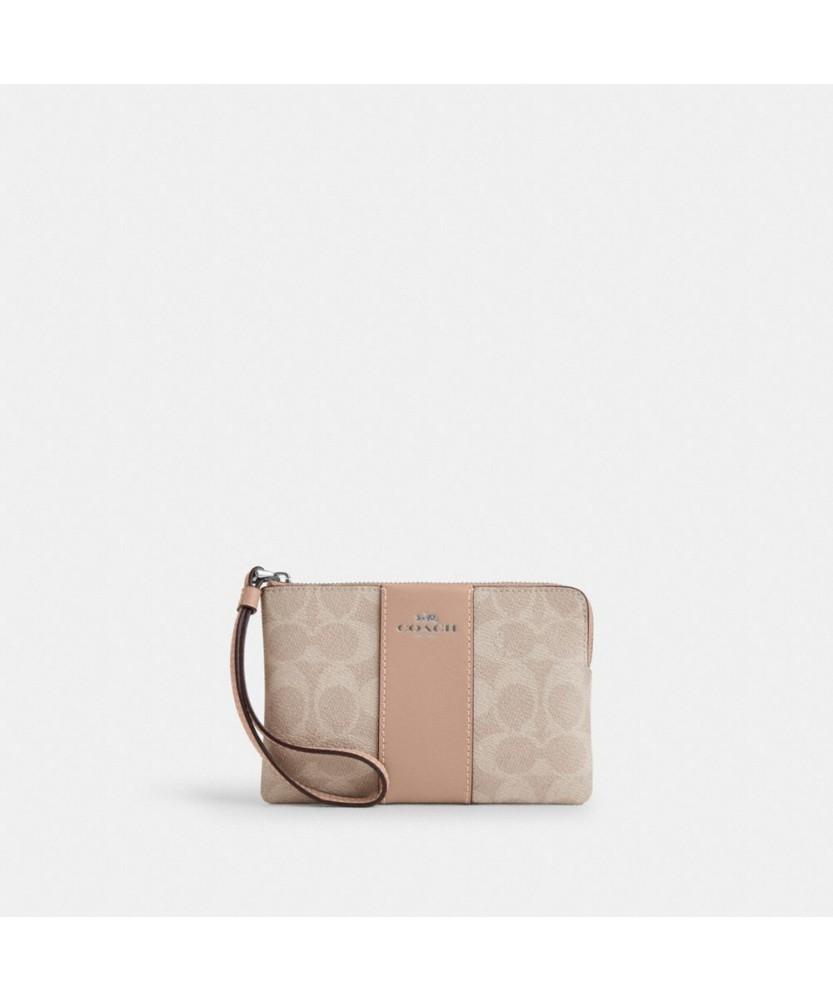Coach Corner Zip Wristlet In Signature
