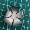 Temperature-Responsive Nickel-Titanium Flower: Opens with Heat, Closes with Cold, Interactive Science Display.