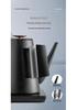 Youmingtang Black & White Electric Kettle: Fast Boiling for Home, Tea Brewing, Water Heating, and Hotel Use.