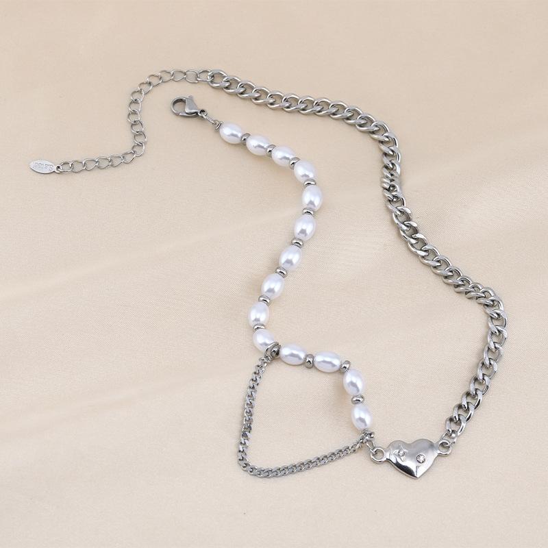 

Steel Titanium Beautiful Heart Pendant Necklace With Pearl And Unique Water Wave Chain