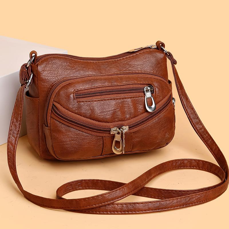 

New shoulder messenger bag soft leather small square bag multi-function multi-compartment medium backpack women s bag mobile phone коричневий