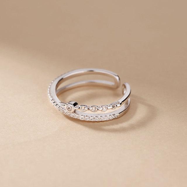 

ANENJERY двухслойное кольцо с крестообразным дизайном из микроциркона для женщин, регулируемые личные аксессуары Resizable серебряный