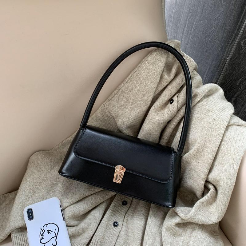 

Фактурная французская женская новая мода ретро 2025 большая вместимость повседневная однотонная сумка-багет с замком портативная подмышку женская чёрный