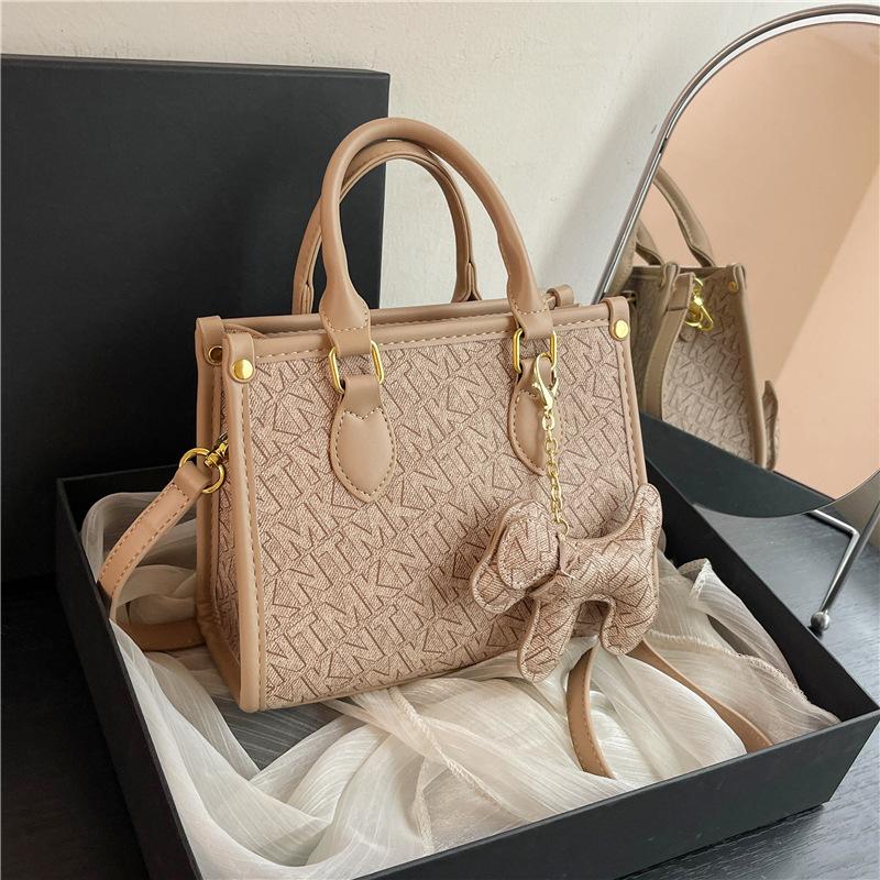 New high-end fashion contrasting color commuter bag portable shoulder oblique span women's bag