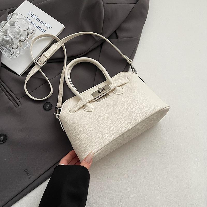 Simple temperament hand bag women's spring new niche fashion messenger bag commuter shoulder bag
