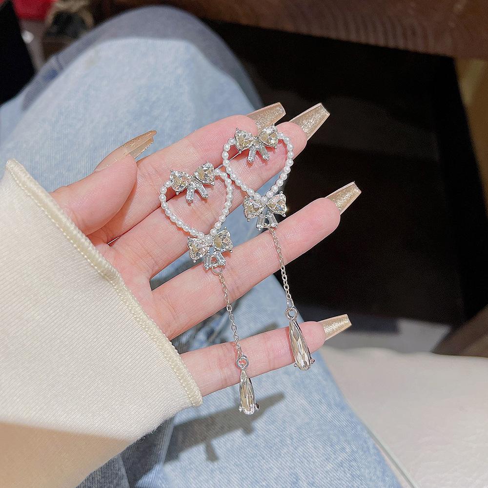 

Серьги-кисточки Love Pearl, роскошные женские светские львицы, темпераментные, полные циркония, бабочки, стразы, серебряные игольчатые серьги серебряный