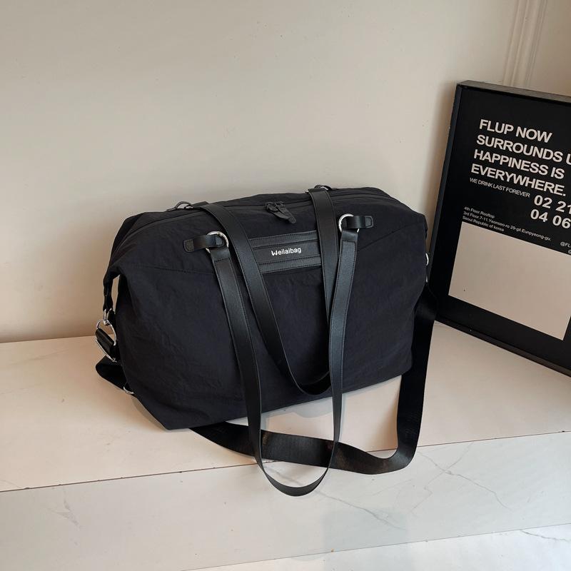 

Large capacity handbag women s fashion commuter travel bag short trip business trip waterproof luggage bag lightweight shoulder bag maternity bag чорний