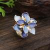 New enamel color hollow geometric daffodil elastic ring women's fashion high-end flower ring