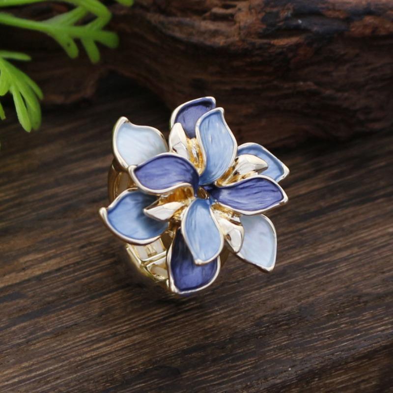 New enamel color hollow geometric daffodil elastic ring women's fashion high-end flower ring