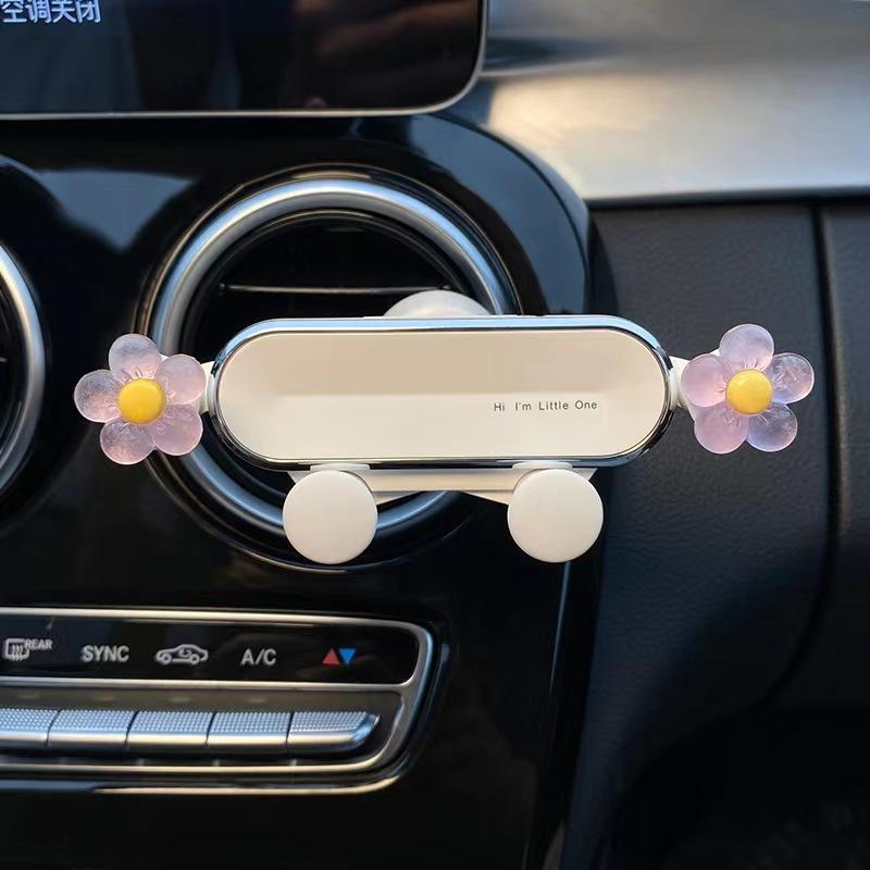 Süße Blume Schwerkraft Auto Handyhalterung, Universelle Lüftungsschlitz Auto-Klemm-Navigations-Stützhalterung 12*4cm violett