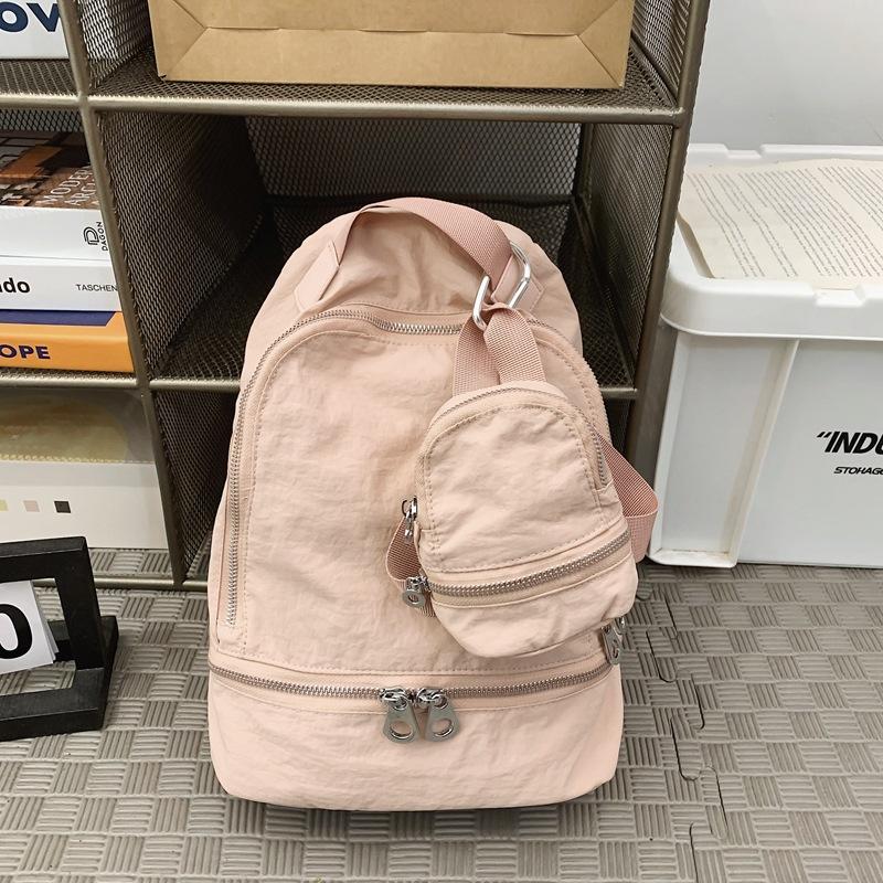 

Городской Простой Рюкзак Рюкзак Большой Вместимости Модная и Повседневная Дорожная Сумка розовый