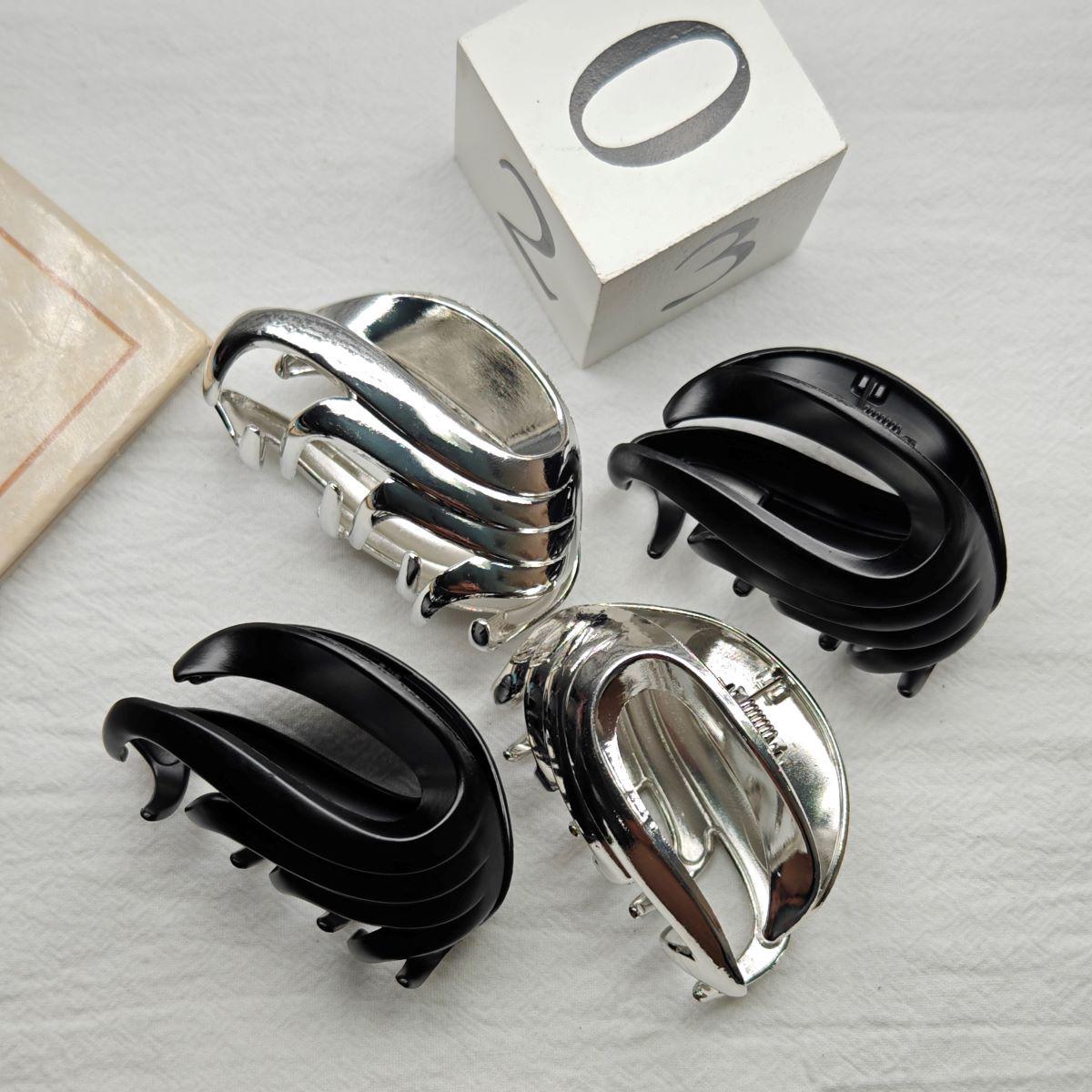 

Elegant Winged Hair Clip: Women s Stylish Simple Updo Claw Clip for Back of Head