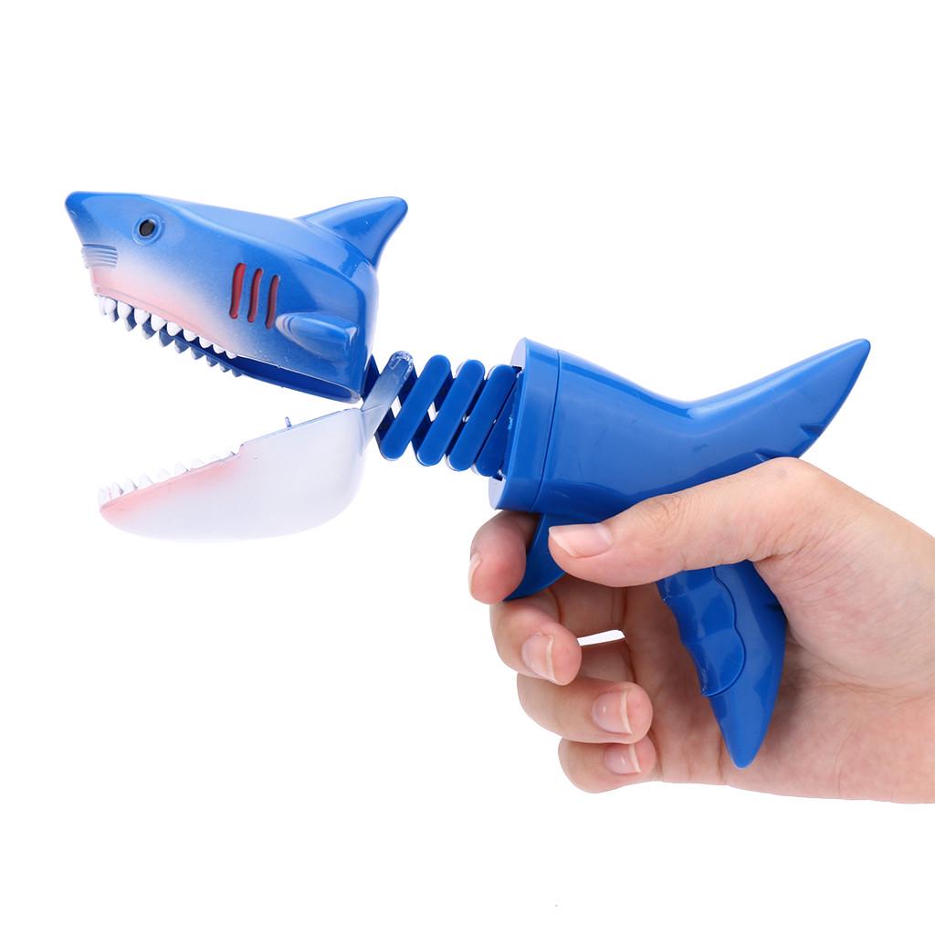 Lustiger Haifisch-Teleskop-Feder-Manipulator Spielzeug-Clip Biss-Hand Dinosaurier Streich Eltern-Kind-Interaktionsspielzeug grün