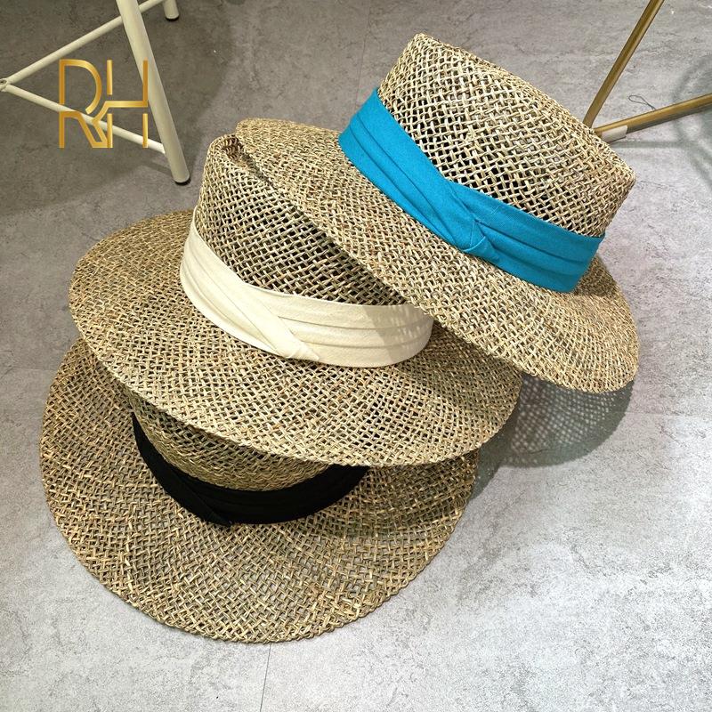 Travel Natural seagrass hollow flat brim hat ladies summer porkpie concave round sun hat beach straw hat with ribbon sale